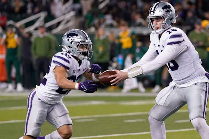 Nov 12, 2022; Waco, Texas, USA; Kansas State Wildcats quarterback Will Howard (18) hands the ball off to Kansas State Wildcats running back Deuce Vaughn (22) against the Baylor Bears during the second half at McLane Stadium.